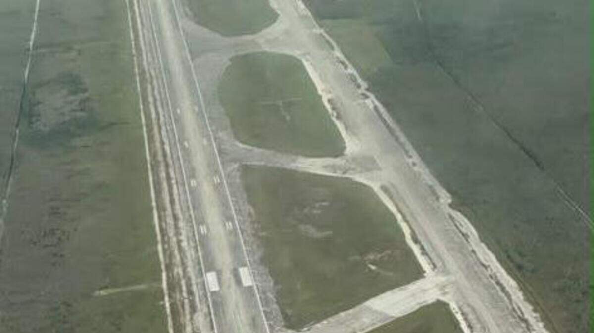 An aerial photo shows all the white industrial tents that once transformed the Dade-Collier Training and Transitional Airport into the immigration detention center Alligator Alcatraz have been taken down.